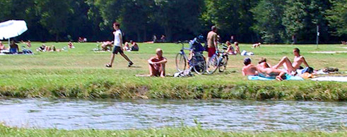 people lay out naked in the Englischer Garten in Munich, Germany